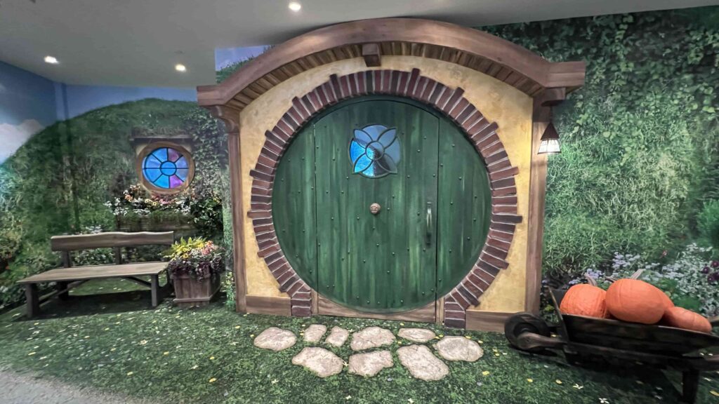 F5 Theming Faux-painted Door and extended Wall Mural to the Floor​